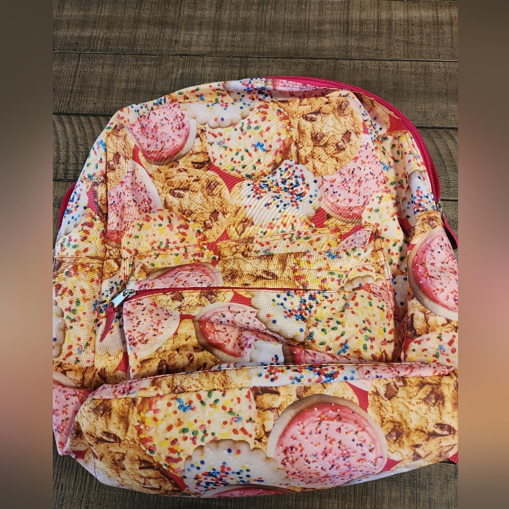 2010s backpack with sublimated pastry design and laptop sleeve